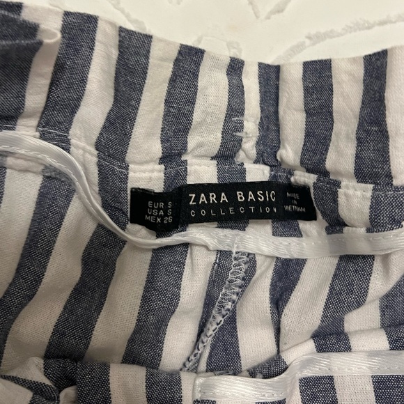 Blue and white striped linen pants with a paper bag waist and belt. - Picture 5 of 5